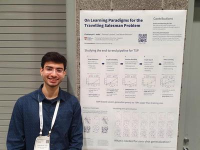 Presenting my poster at the NeurIPS 2019 GRL workshop.